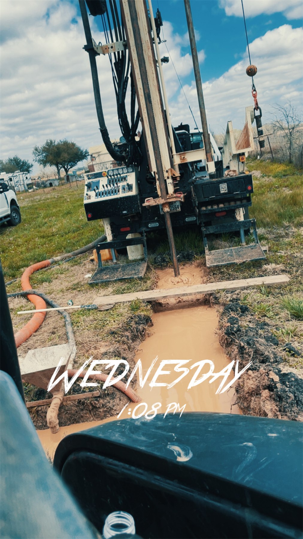 Water well drilling rig working on site