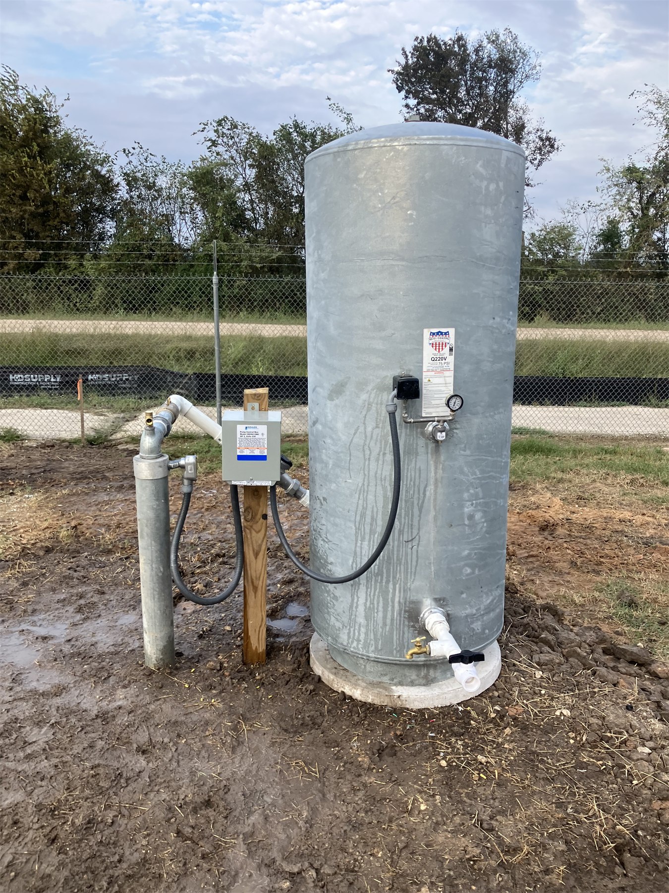 Installed water system tank and well equipment